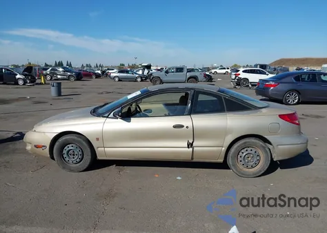 1999 Saturn Sc1 из США, поврежденный, VIN 1G8ZP1287XZ335011